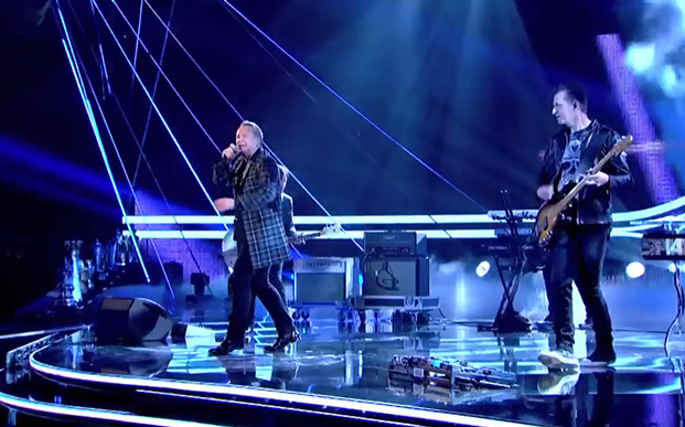 Simple Minds frontman Jim Kerr wearing Italian National tartan jacket